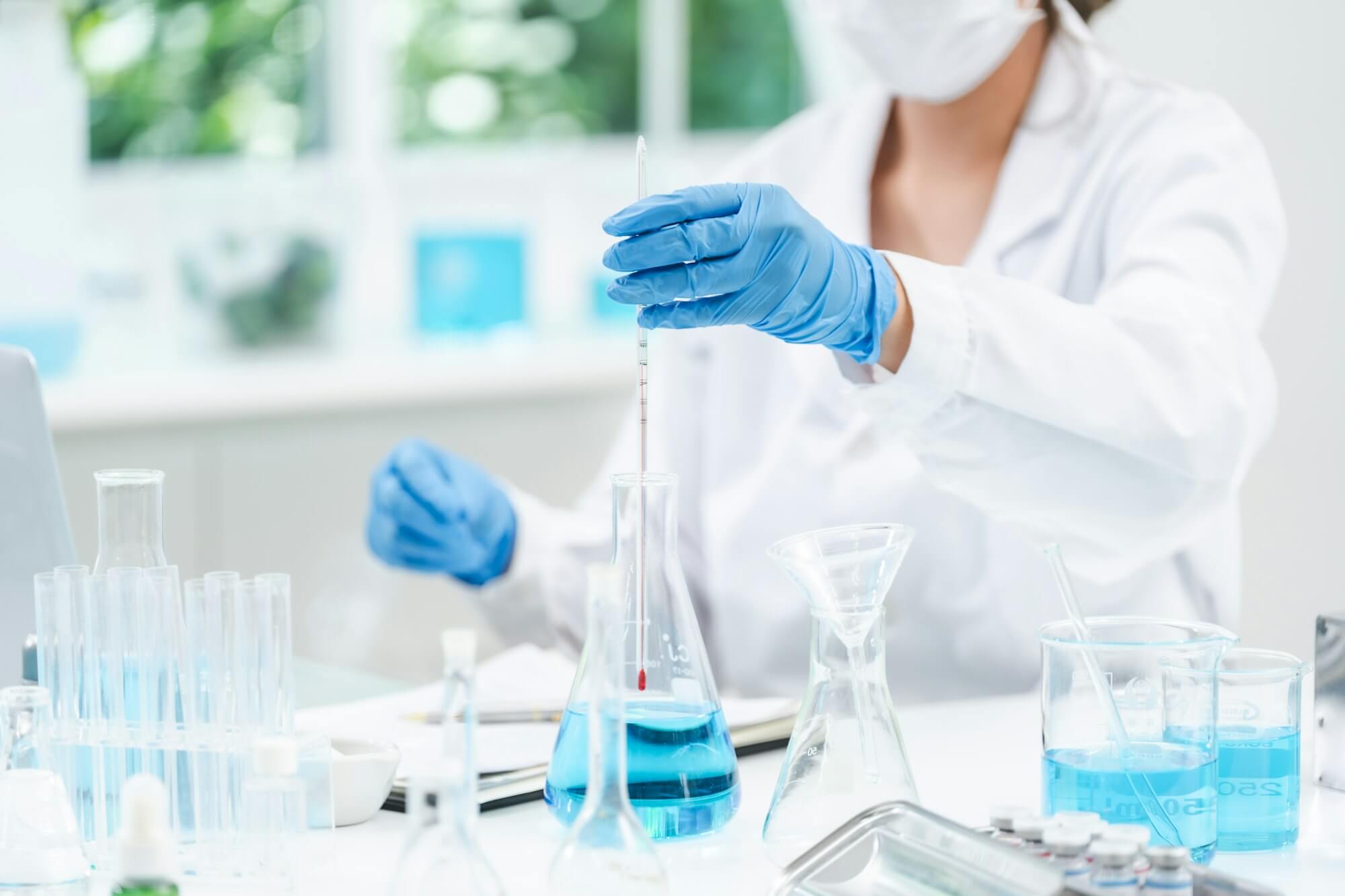 researcher working in laboratory for medicals science research using scientific equipment technology